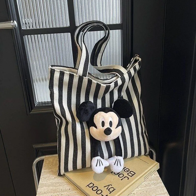 Disney Mickey Mouse Black White Striped Canvas Tote Bag for Women Large Capacity Casual Shoulder Bag Cute Doll Decor Handbag
Disney Mickey Mouse Black White Striped Canvas Tote Bag for Women Large Capacity Casual Shoulder Bag Cute Doll Decor Handbag