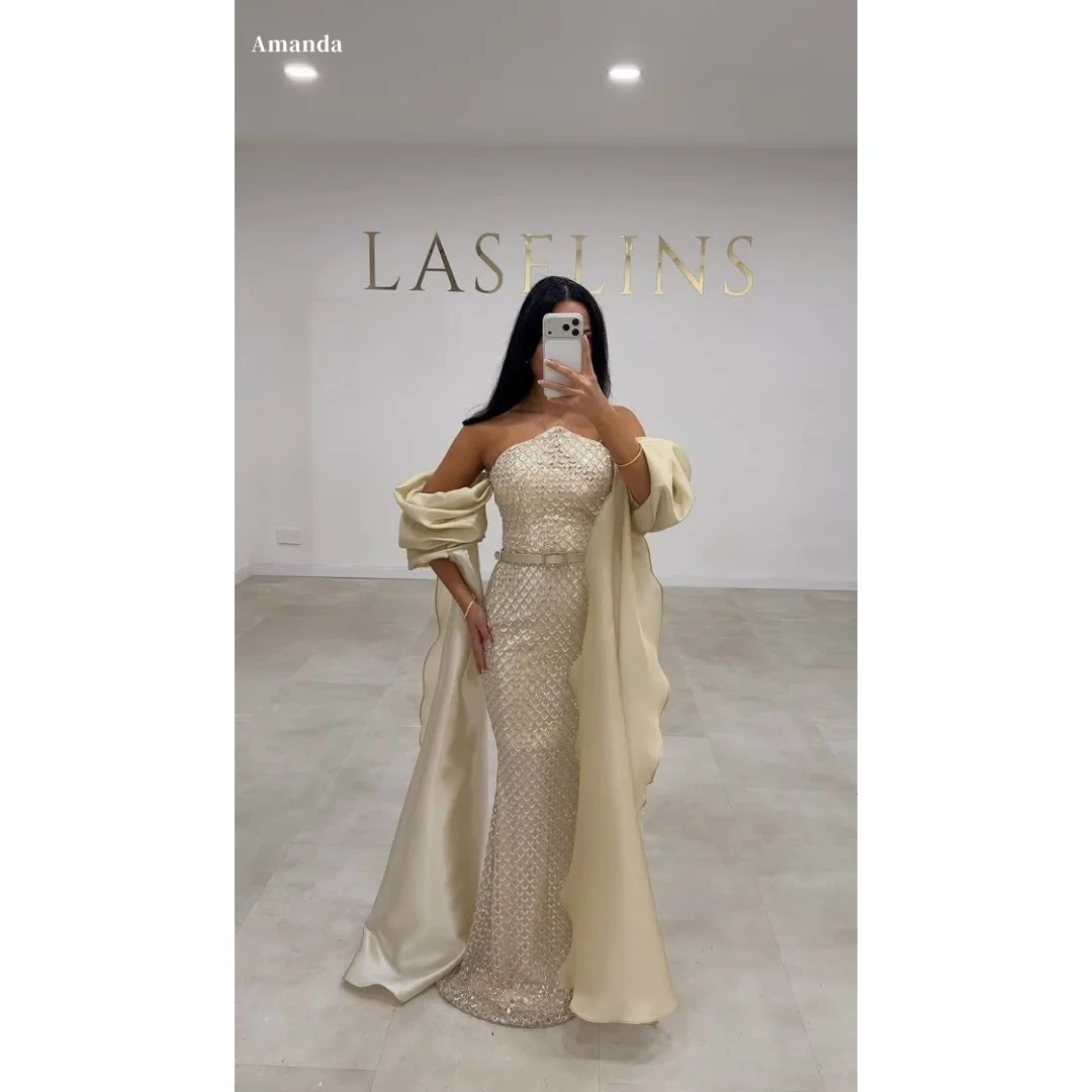 Amanda Customized Champagne Strapless Prom Dress Sequin Fabric Satin Ruffle Shawl Belted Waist vestidos de noche Mermaid 2025
Amanda Customized Champagne Strapless Prom Dress Sequin Fabric Satin Ruffle Shawl Belted Waist vestidos de noche Mermaid 2025