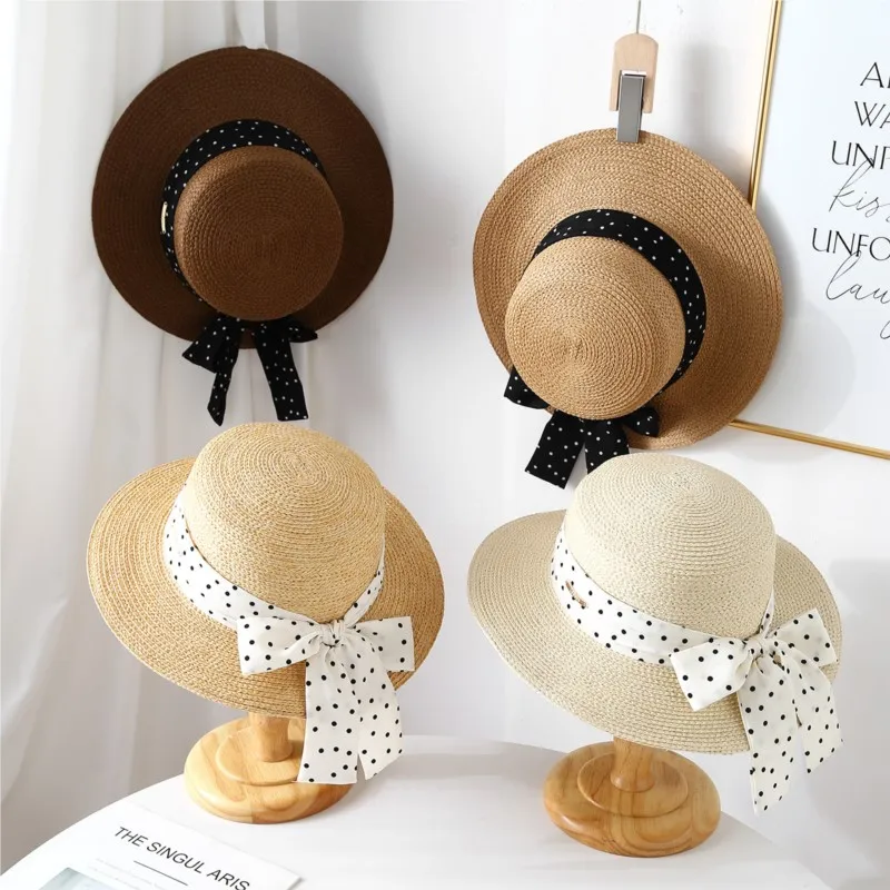 A new style of flat-topped hat for women with large seaside top and woven
A new style of flat-topped hat for women with large seaside top and woven