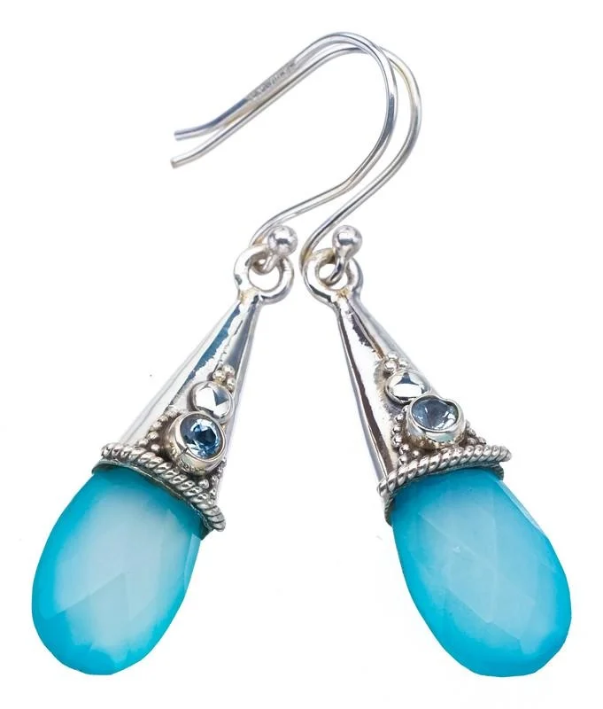 Серьги из серебра 1,75 дюйма с халцедоном
Серьги из серебра 1,75 дюйма с халцедоном