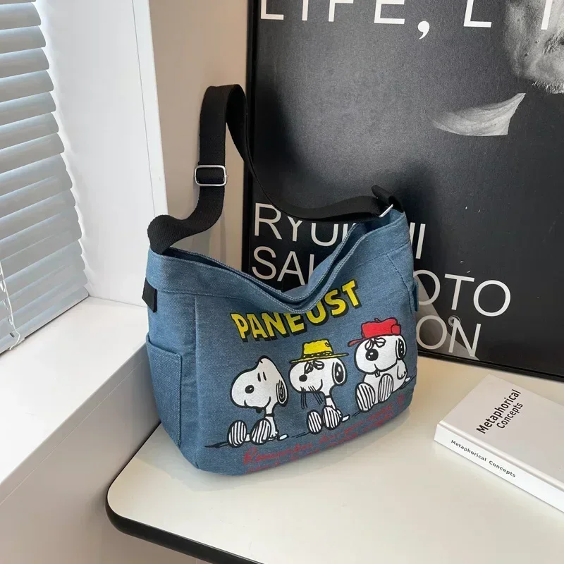 Snoopy women Large Capacity Shoulder Cross Bag New Cute Cartoon Denim Canvas messenger Bag girl Commuting Tote bag
Snoopy women Large Capacity Shoulder Cross Bag New Cute Cartoon Denim Canvas messenger Bag girl Commuting Tote bag