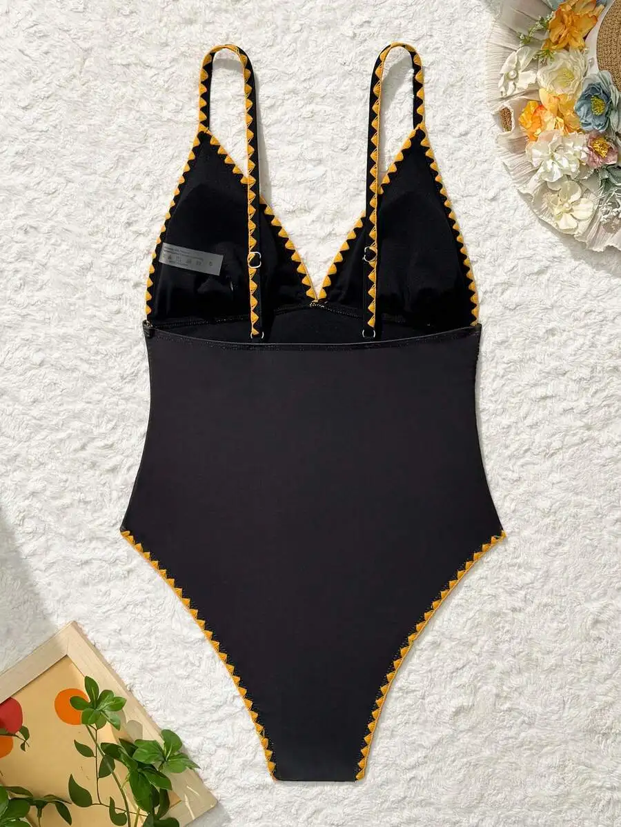 Womens One-Piece Swimsuit With Adjustable Straps And Contrast Trim
Womens One-Piece Swimsuit With Adjustable Straps And Contrast Trim
