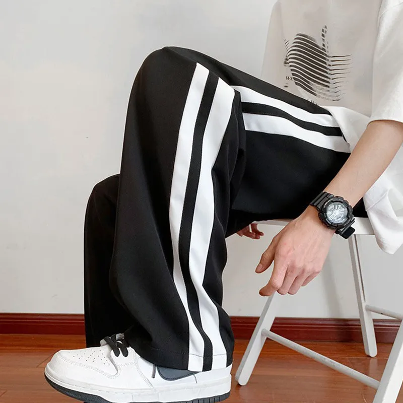 Летние тонкие мужские повседневные брюки из ледяного шелка в полоску, свободные, широкие, длинные, прямого кроя, оверсайз, универсальные, в гонконгском стиле
Летние тонкие мужские повседневные брюки из ледяного шелка в полоску, свободные, широкие, длинные, прямого кроя, оверсайз, универсальные, в гонконгском стиле