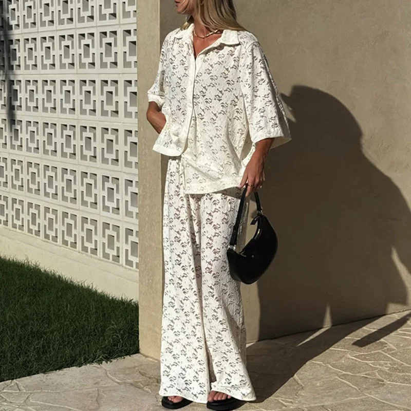Holiday Short Sleeved Beach Suit Fashion Lapel Button Shirt + Long Pants Women's 2pc Set 2025 Lace Jacquard Hollow Loose Outfit
Holiday Short Sleeved Beach Suit Fashion Lapel Button Shirt + Long Pants Women's 2pc Set 2025 Lace Jacquard Hollow Loose Outfit