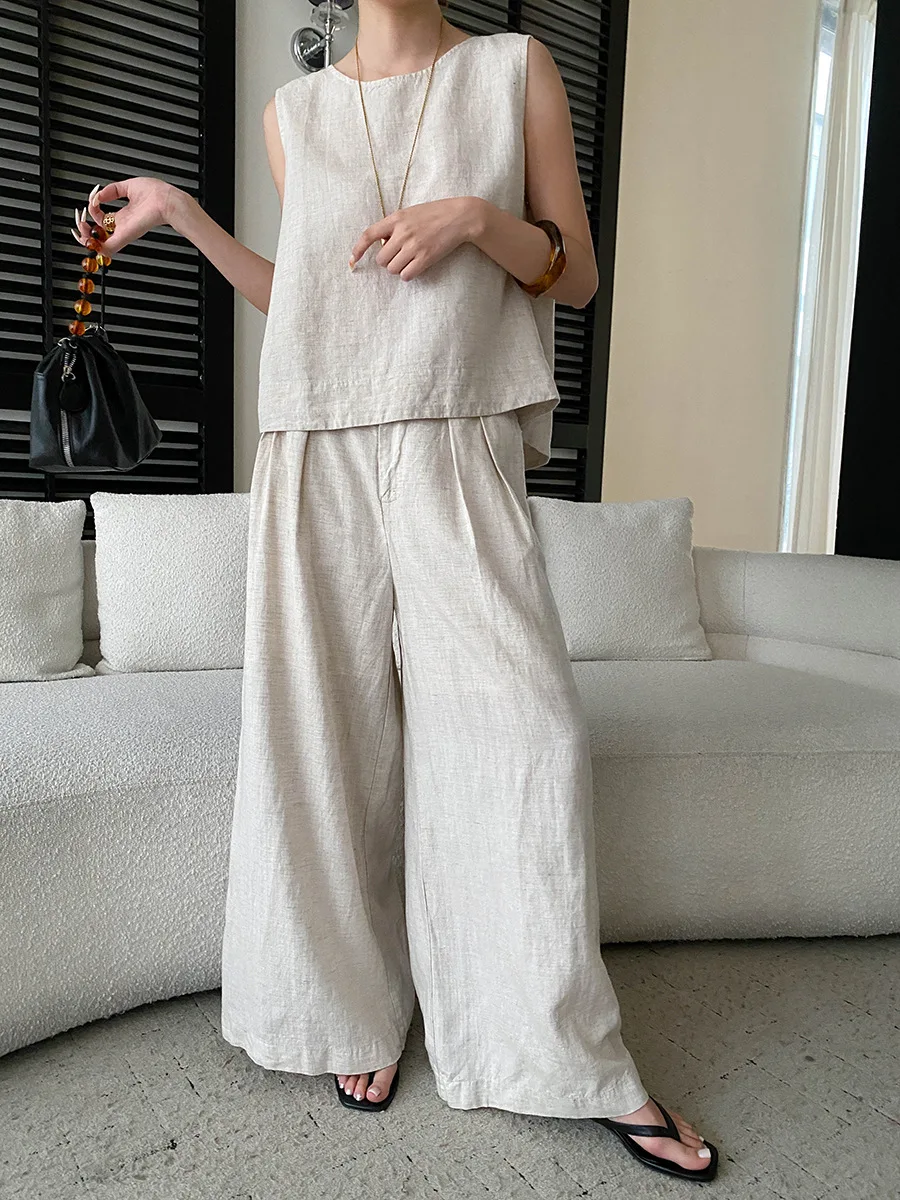 Summer women's casual solid color back hollow design sleeveless vest wide leg pants set
Summer women's casual solid color back hollow design sleeveless vest wide leg pants set