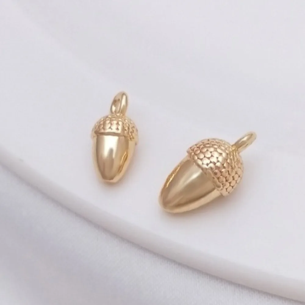 1 шт. медные подвески 14 К золотого цвета сосновые шишки маленький кулон глянцевая гайка маленький капельный кулон ручной работы DIY серьги-браслеты
1 шт. медные подвески 14 К золотого цвета сосновые шишки маленький кулон глянцевая гайка маленький капельный кулон ручной работы DIY серьги-браслеты