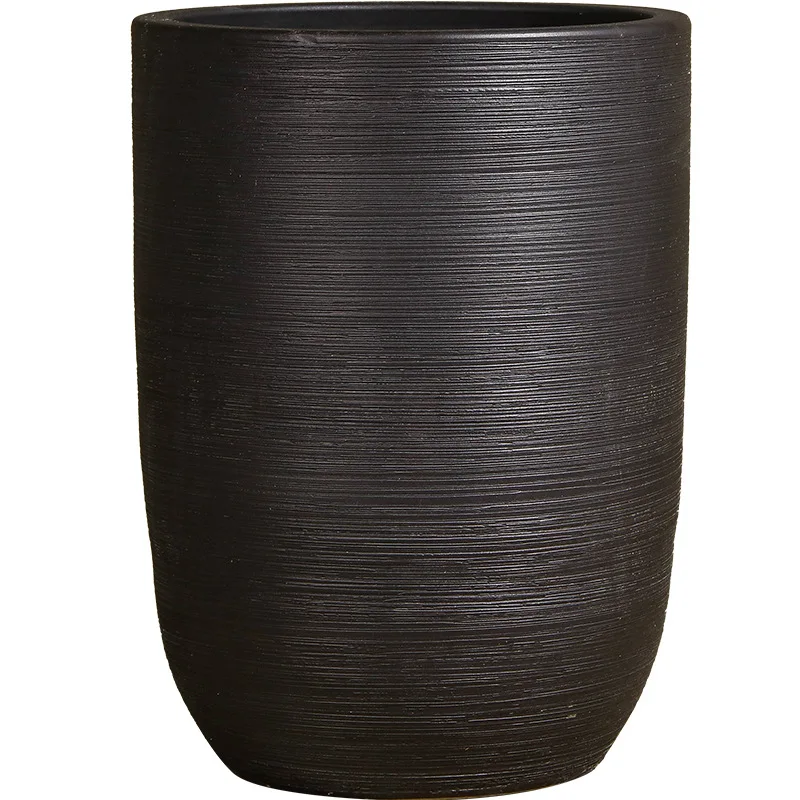 Nordic minimalist creative flower pot, interior decoration, floor-standing large plant black ceramic jar, wide-mouth vase
Nordic minimalist creative flower pot, interior decoration, floor-standing large plant black ceramic jar, wide-mouth vase
