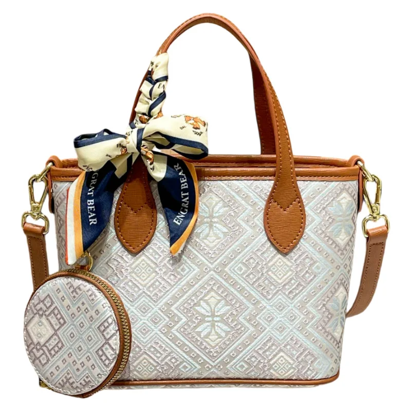 Luxury Zhuang Brocade & Xiangyunsha Tote Bag for Women, Versatile 2026 Commuter Shoulder & Crossbody Bag
Luxury Zhuang Brocade & Xiangyunsha Tote Bag for Women, Versatile 2026 Commuter Shoulder & Crossbody Bag