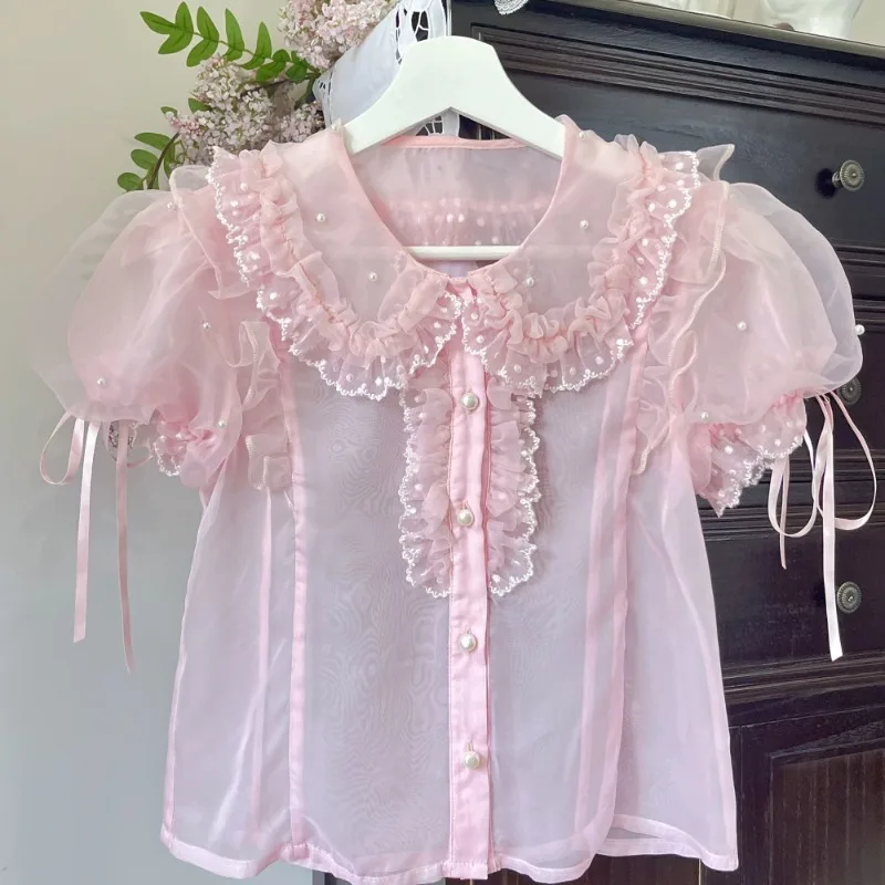 Organza All-match Lolita Shirt Women Peter Sweet Pan Collar Fungus Blouses 2025 Sumemr New Puff Sleeve Blusas De Mujer
Organza All-match Lolita Shirt Women Peter Sweet Pan Collar Fungus Blouses 2025 Sumemr New Puff Sleeve Blusas De Mujer