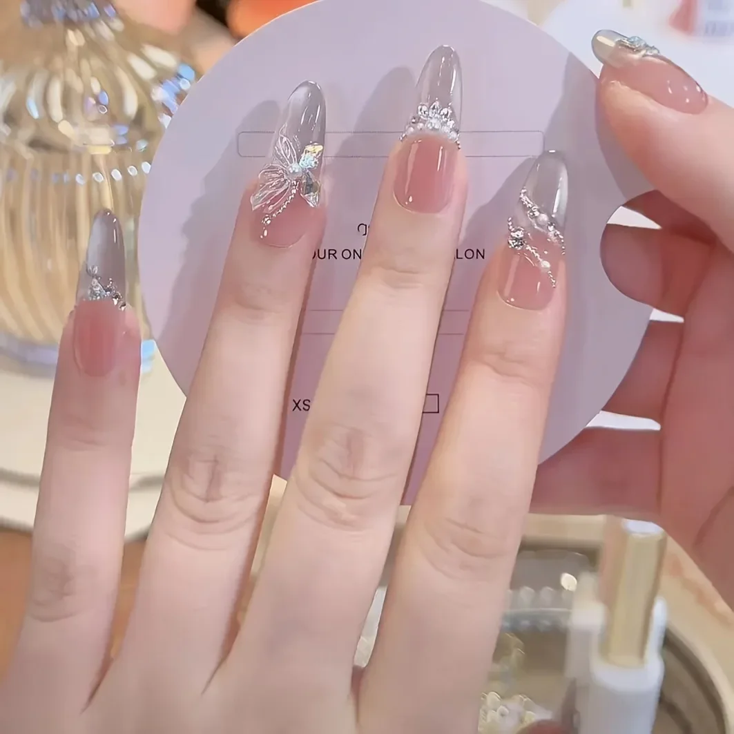 10pcs Handcrafted Long Oval Press-On Nails with 3D Butterfly&Cat Eye Designs Pearl Accents for Women Casual Attire and Occasions
10pcs Handcrafted Long Oval Press-On Nails with 3D Butterfly&Cat Eye Designs Pearl Accents for Women Casual Attire and Occasions
