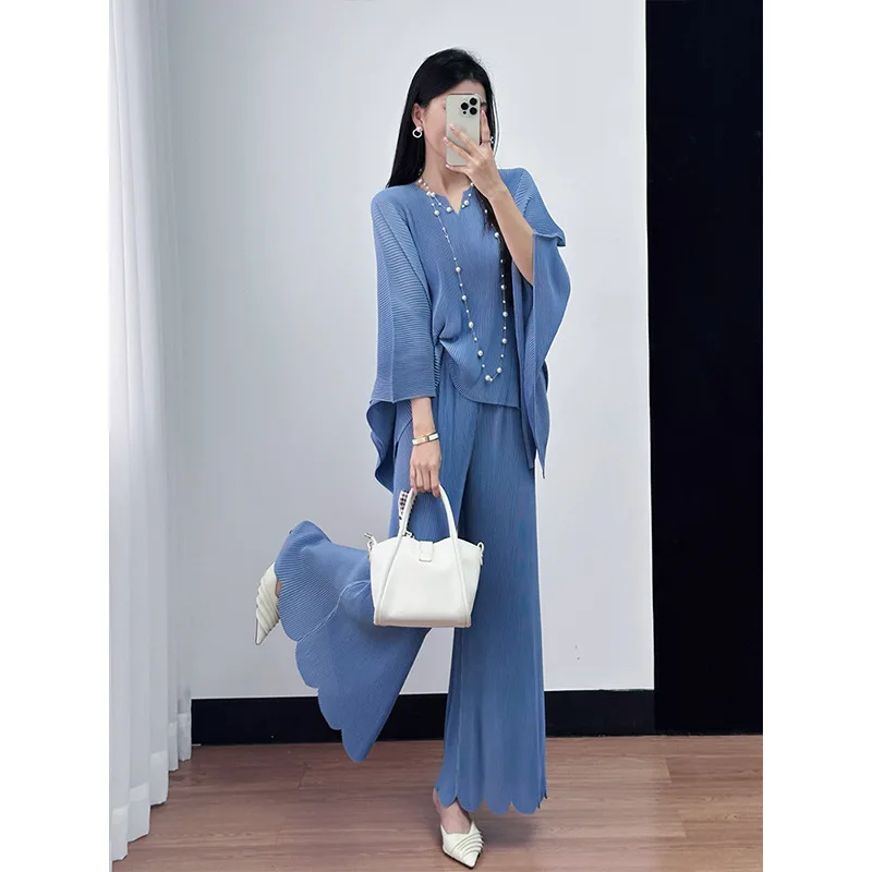Fashion Women's Suit Miyake Summer New High-end Pleated Solid Colour Top High Waisted Wide Leg Pants Irregular Two Piece Set
Fashion Women's Suit Miyake Summer New High-end Pleated Solid Colour Top High Waisted Wide Leg Pants Irregular Two Piece Set