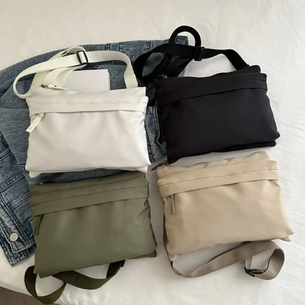 Большая вместительная нейлоновая тканевая сумка через плечо, легкая парусиновая сумка для отдыха, однотонная сумка через плечо для поездок на работу, уличная сумка
Большая вместительная нейлоновая тканевая сумка через плечо, легкая парусиновая сумка для отдыха, однотонная сумка через плечо для поездок на работу, уличная сумка