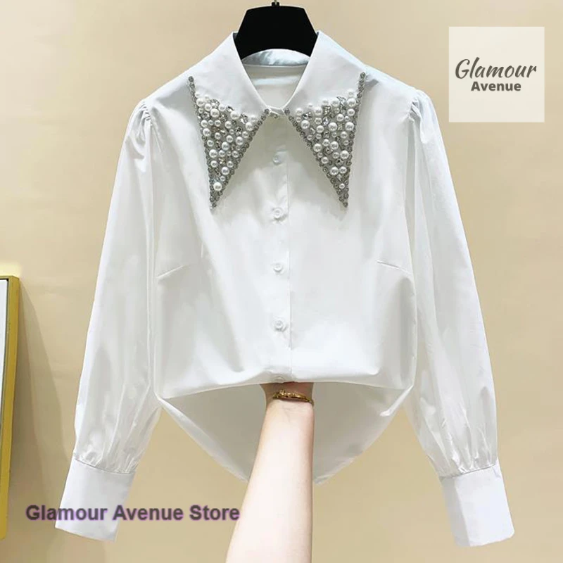 French heavy industry beaded diamond doll collar white shirt female spring and autumn new loose fashion design sense niche shirt
French heavy industry beaded diamond doll collar white shirt female spring and autumn new loose fashion design sense niche shirt