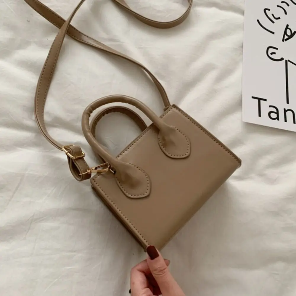 PU Leather Small Square Bag Minimalist Top Handle Mini Handbag Adjustable Straps Solid Color Women's Crossbody Bag Outing
PU Leather Small Square Bag Minimalist Top Handle Mini Handbag Adjustable Straps Solid Color Women's Crossbody Bag Outing
