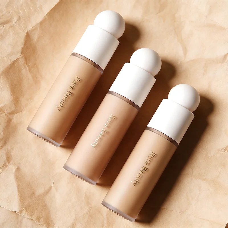 Жидкая тональная основа Rare Beauty Silky Liquid Foundation Cream для лица: высокое покрытие, стойкая, водостойкая, осветляющая, отбеливающая кожу, для макияжа.
Жидкая тональная основа Rare Beauty Silky Liquid Foundation Cream для лица: высокое покрытие, стойкая, водостойкая, осветляющая, отбеливающая кожу, для макияжа.