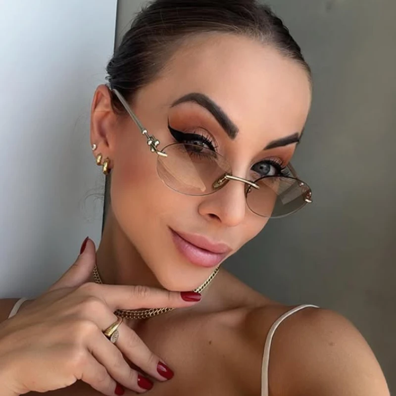 Oval Frameless Women's Luxury Brand Sunglasses Fashion Small Metal Frame Round Sun Glasses Ladies Rimless Elegant Shades UV400
Oval Frameless Women's Luxury Brand Sunglasses Fashion Small Metal Frame Round Sun Glasses Ladies Rimless Elegant Shades UV400
