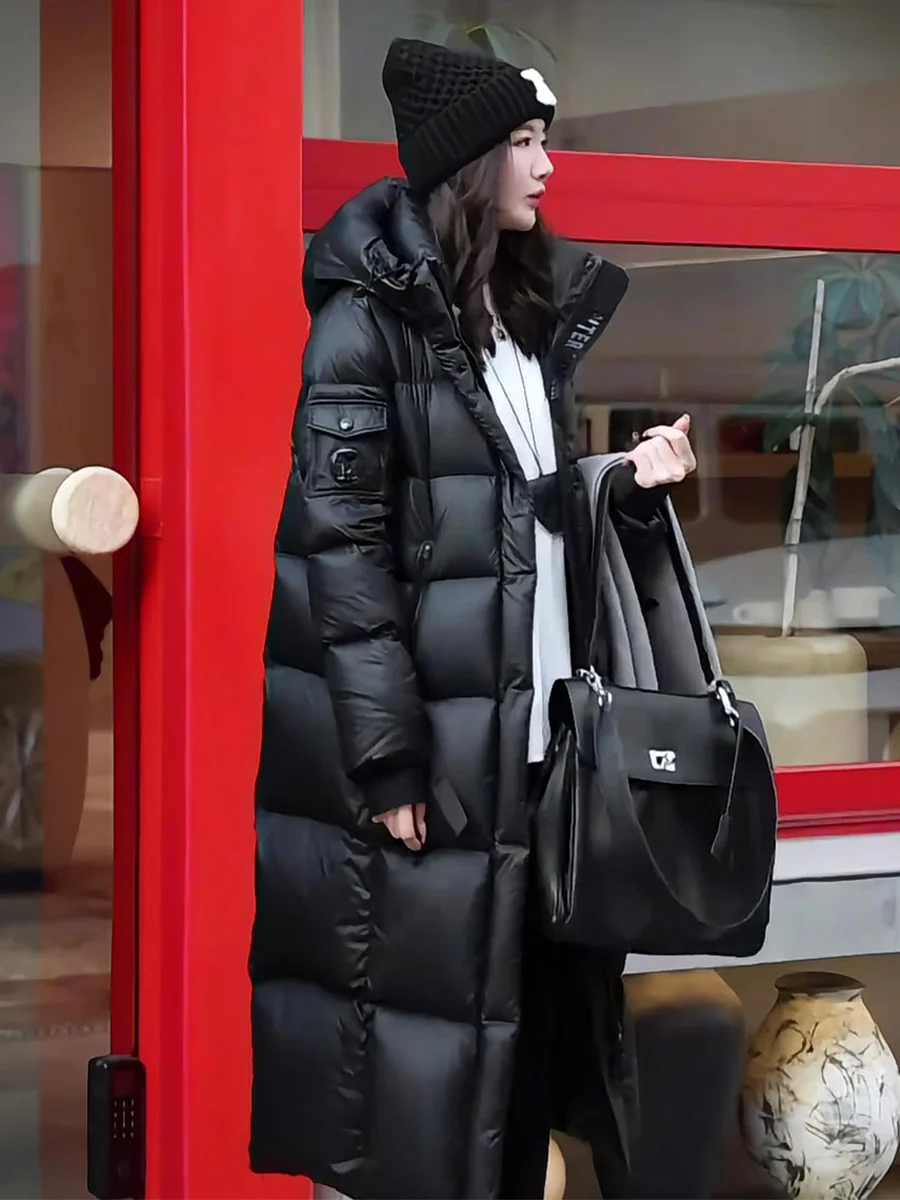 Модная женская удлиненная пуховая куртка выше колена, теплая, с белым пухом, зимняя, повседневная, на молнии, с дизайнерскими элементами
Модная женская удлиненная пуховая куртка выше колена, теплая, с белым пухом, зимняя, повседневная, на молнии, с дизайнерскими элементами