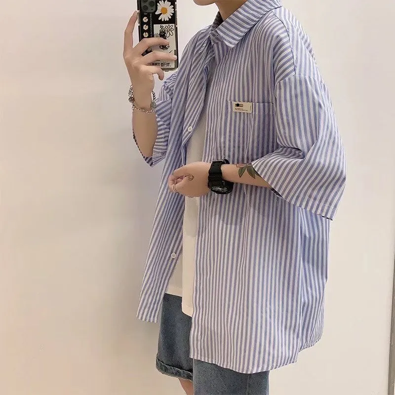 Blue Striped Men's irt Summer ort Sve Loose Fit y Sle Japanese Faion f Sve Button down Youth Trend
Blue Striped Men's irt Summer ort Sve Loose Fit y Sle Japanese Faion f Sve Button down Youth Trend