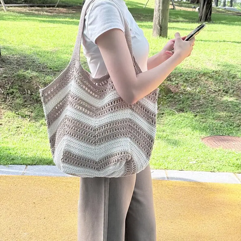 Большой вместительный тканый сетчатый рюкзак, женский летний пляжный отдых, вязаная полая повседневная сумка на плечо
Большой вместительный тканый сетчатый рюкзак, женский летний пляжный отдых, вязаная полая повседневная сумка на плечо