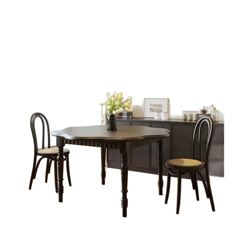 French retro style black dining table petal shape small apartment home restaurant eating table designer creative dining table
French retro style black dining table petal shape small apartment home restaurant eating table designer creative dining table