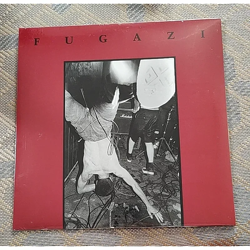 Genuine Guaranteed Fugazi 13 Songs Red Vinyl LP for Fugazi
Genuine Guaranteed Fugazi 13 Songs Red Vinyl LP for Fugazi
