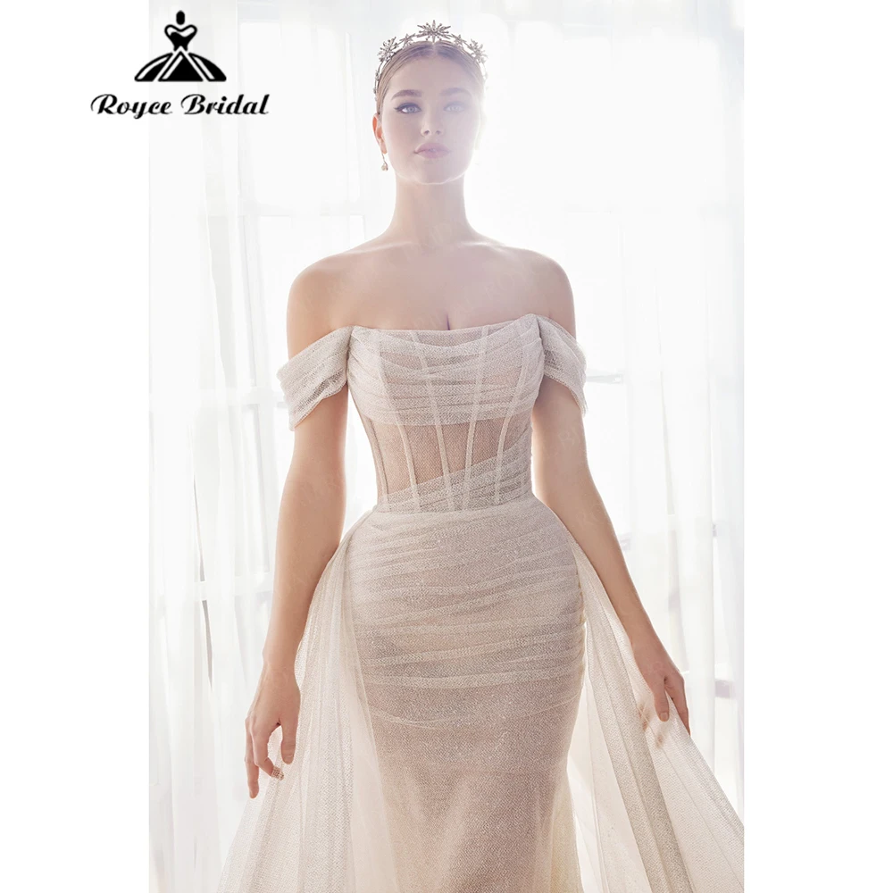 Roycebridal блестящее тюлевое свадебное платье русалки без бретелек с открытыми плечами и скользящим шлейфом 2025 Индивидуальные платья De Novias
Roycebridal блестящее тюлевое свадебное платье русалки без бретелек с открытыми плечами и скользящим шлейфом 2025 Индивидуальные платья De Novias