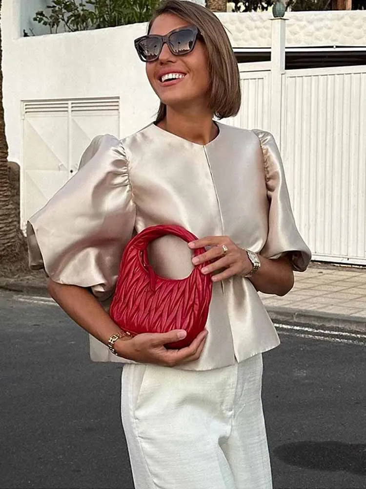 BKQU Elegant Satin Puffy Short Sleeve Shirts Women Solid Loose O-neck Single Breasted Blouses Female 2025 Chic Streetwear Tops
BKQU Elegant Satin Puffy Short Sleeve Shirts Women Solid Loose O-neck Single Breasted Blouses Female 2025 Chic Streetwear Tops