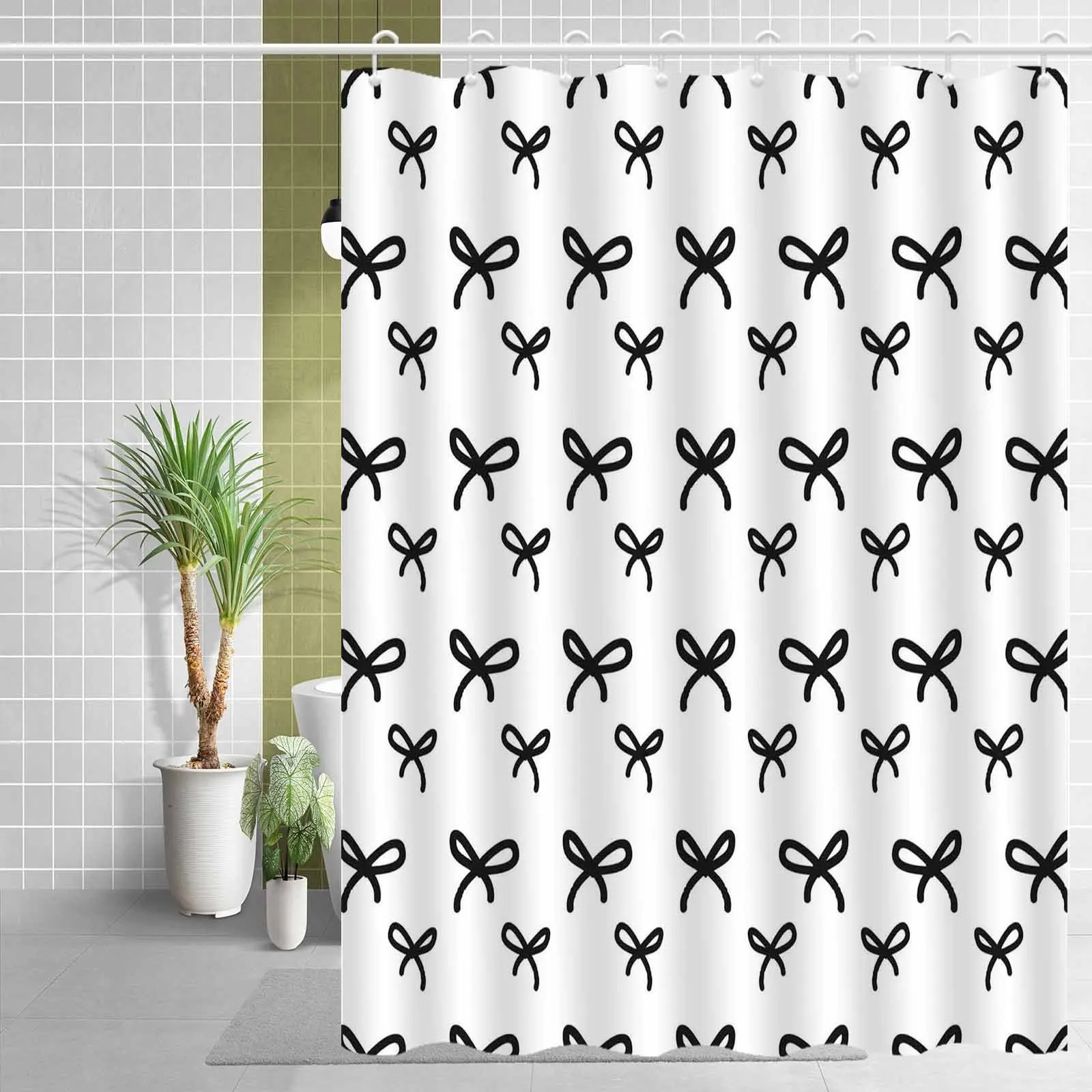 Black and white bow-patterned shower curtain with hooks, machine washable polyester fabric, suitable for bathroom décor.
Black and white bow-patterned shower curtain with hooks, machine washable polyester fabric, suitable for bathroom décor.