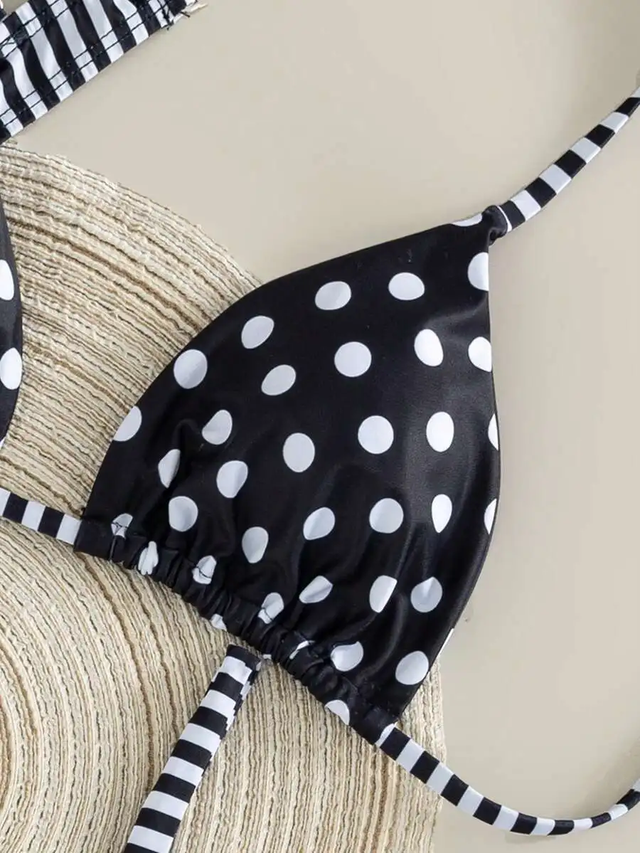Black White Polka Dot And Striped Triangle Halter Backless Bikini Top With Matching Bottoms
Black White Polka Dot And Striped Triangle Halter Backless Bikini Top With Matching Bottoms