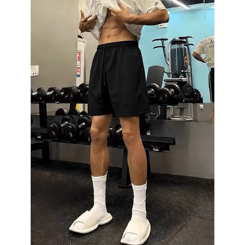 Men's Casual Loose Fit Ice Silk Shorts Quick Dry Summer Fitness Pants mid Waist Pocket Design Fashionable Black And White
Men's Casual Loose Fit Ice Silk Shorts Quick Dry Summer Fitness Pants mid Waist Pocket Design Fashionable Black And White