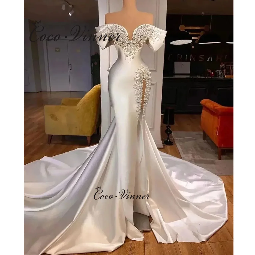 Customized Off The Shoulder High Quality Satin Mermaid Wedding Dresses 2026 Peals Heavy Beading Silt Sexy Wedding Dresses W1460
Customized Off The Shoulder High Quality Satin Mermaid Wedding Dresses 2026 Peals Heavy Beading Silt Sexy Wedding Dresses W1460