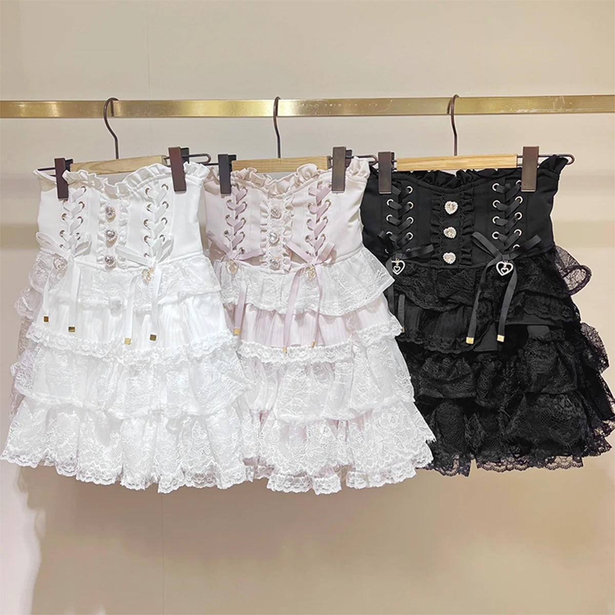 Sweet Lolita Style Mini Skirt Women Elegant Lace Bandage Japanese Party Cake Skirts Girls Y2k Metal Buckle Short Skirt 2025
Sweet Lolita Style Mini Skirt Women Elegant Lace Bandage Japanese Party Cake Skirts Girls Y2k Metal Buckle Short Skirt 2025