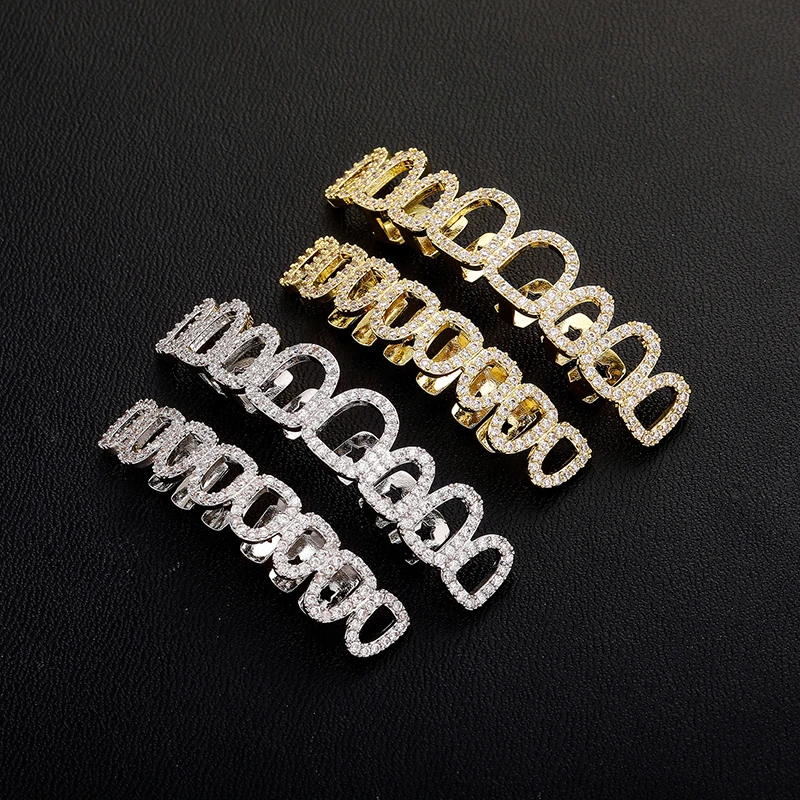 Hip Hop Hollow Teeth Grillzs Gold Silver Color Micro Pave CZ Zircon Bling Iced Out Men Rapper Jewelry
Hip Hop Hollow Teeth Grillzs Gold Silver Color Micro Pave CZ Zircon Bling Iced Out Men Rapper Jewelry