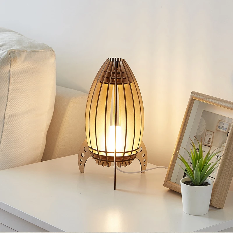 Wood Carved Rocket Table Lamp for Bedroom Bedside Nordic Wooden Table Light for Kids Handmade Gift Night Light Living Room Decor 
Wood Carved Rocket Table Lamp for Bedroom Bedside Nordic Wooden Table Light for Kids Handmade Gift Night Light Living Room Decor