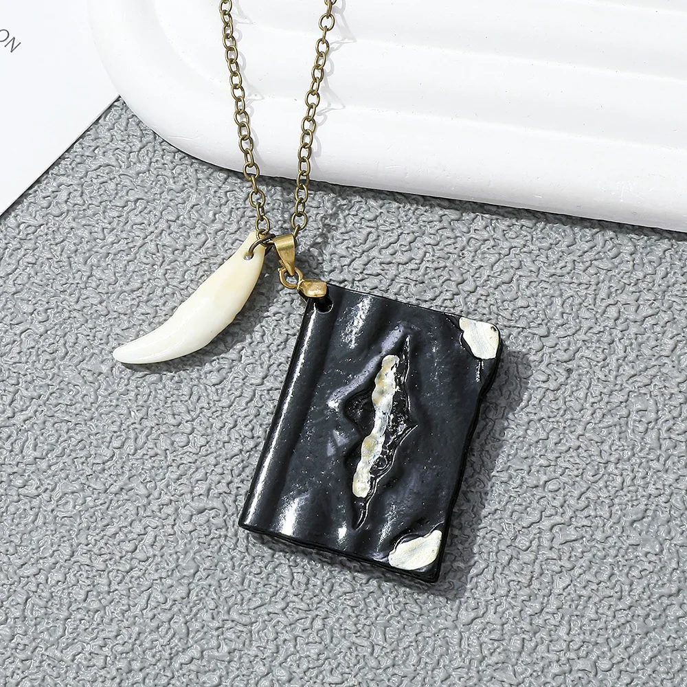 Vintage Punk Wolf Fang Book Necklace Creative Unique Pendant for Men Jewelry Accessory Personality Gift
Vintage Punk Wolf Fang Book Necklace Creative Unique Pendant for Men Jewelry Accessory Personality Gift