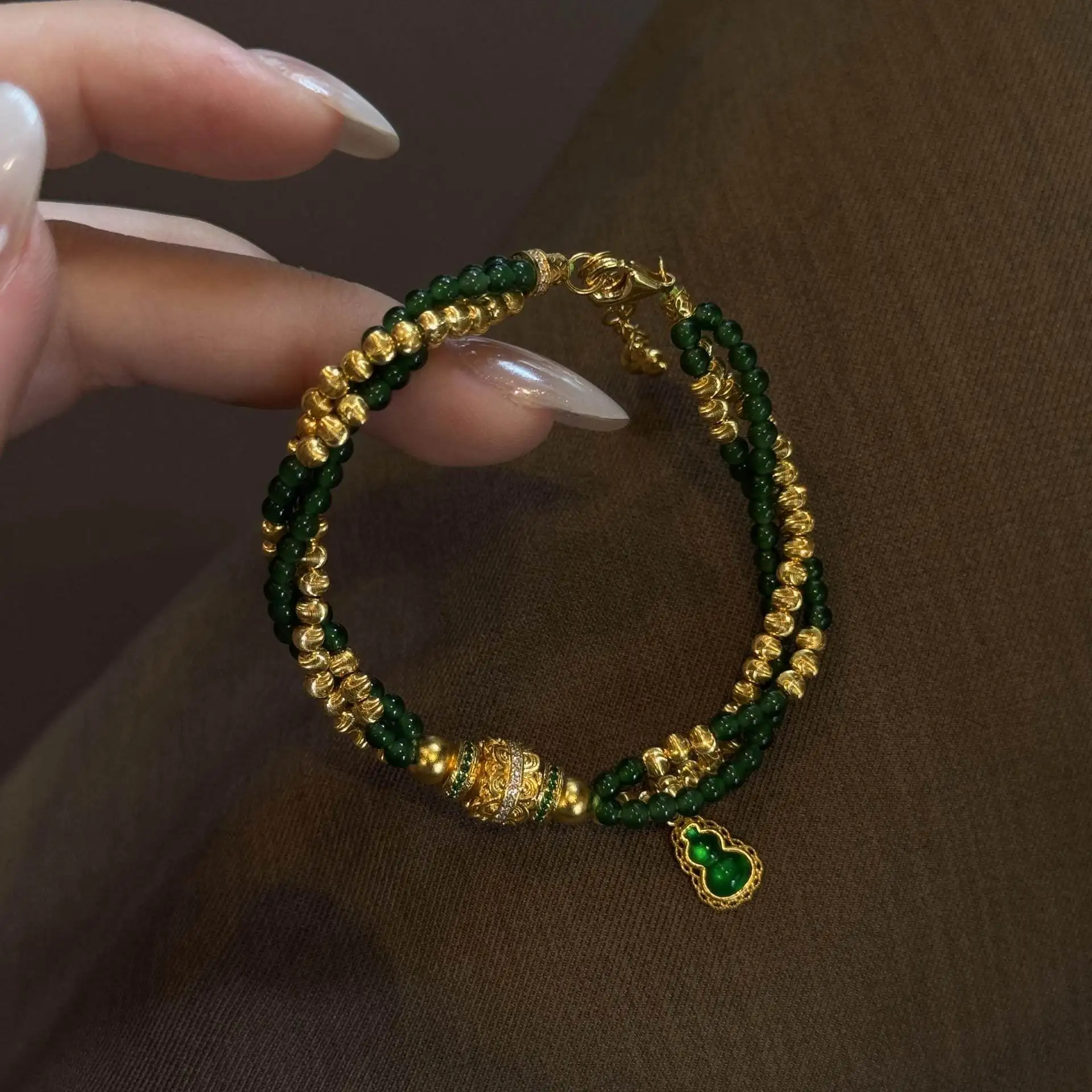Vintage Coiled Wealth Bracelet, Green Jade Beads Gold Gourd Charm, Double Layer Lucky Amulet Adjustable Gift for Women
Vintage Coiled Wealth Bracelet, Green Jade Beads Gold Gourd Charm, Double Layer Lucky Amulet Adjustable Gift for Women