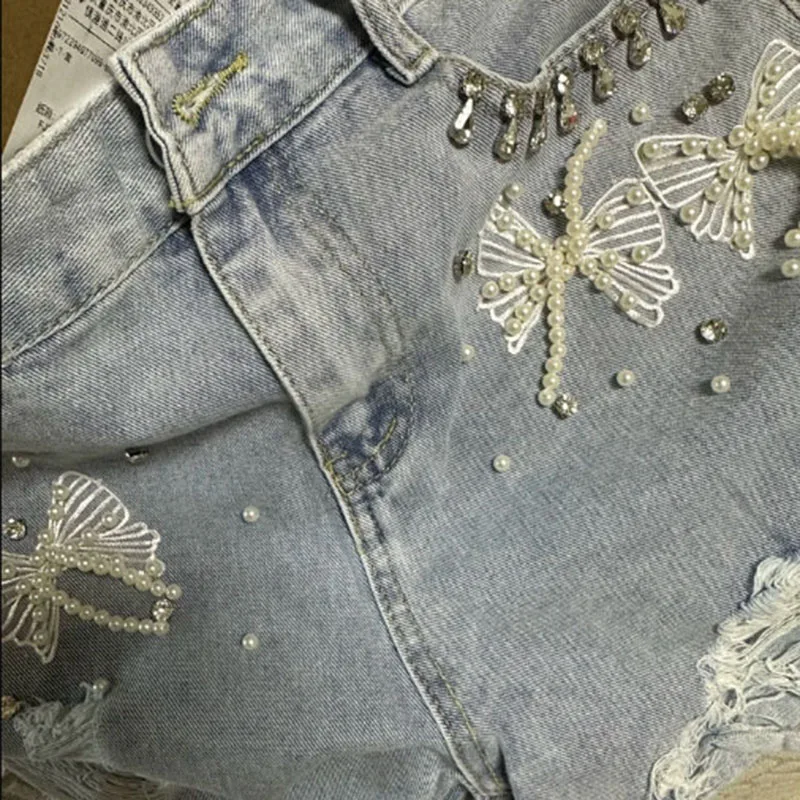 Women Denim Shorts Diamonds Butterfly Knots Round Beads Decoration High Waist Loose A-line Simple Daily Casual Wide Leg Shorts
Women Denim Shorts Diamonds Butterfly Knots Round Beads Decoration High Waist Loose A-line Simple Daily Casual Wide Leg Shorts