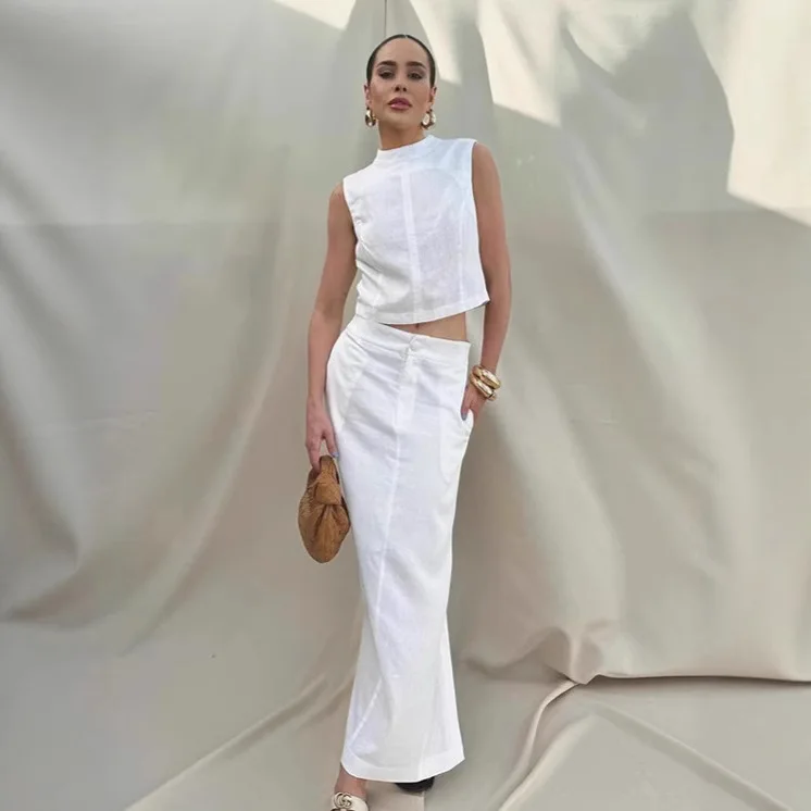 2026 White Long Skirt Set For Women Sleeveless Stand Collar Top High Waist Slit Skirt Female Loose Office Lady Skirt Set
2026 White Long Skirt Set For Women Sleeveless Stand Collar Top High Waist Slit Skirt Female Loose Office Lady Skirt Set