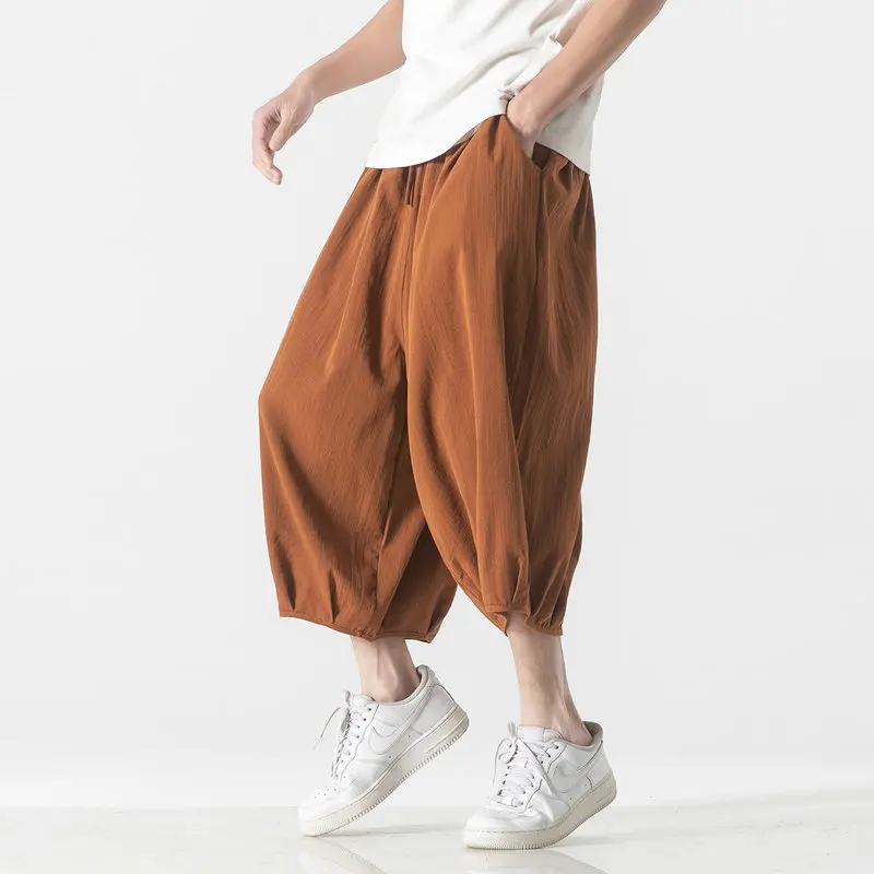 Summer Wide Leg Calf-Length Pants Men Vintage Harem Pants Male Elastic Waist Men Jogger Sweatpants New Large Size 5XL
Summer Wide Leg Calf-Length Pants Men Vintage Harem Pants Male Elastic Waist Men Jogger Sweatpants New Large Size 5XL