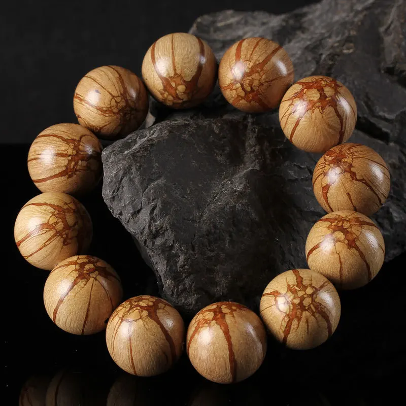 Exquisitely Crafted Dragon Beard Vine Bracelet: Plum Blossom Bone Dan Buddhist Prayer Beads, Unisex Gift Jewelry
Exquisitely Crafted Dragon Beard Vine Bracelet: Plum Blossom Bone Dan Buddhist Prayer Beads, Unisex Gift Jewelry