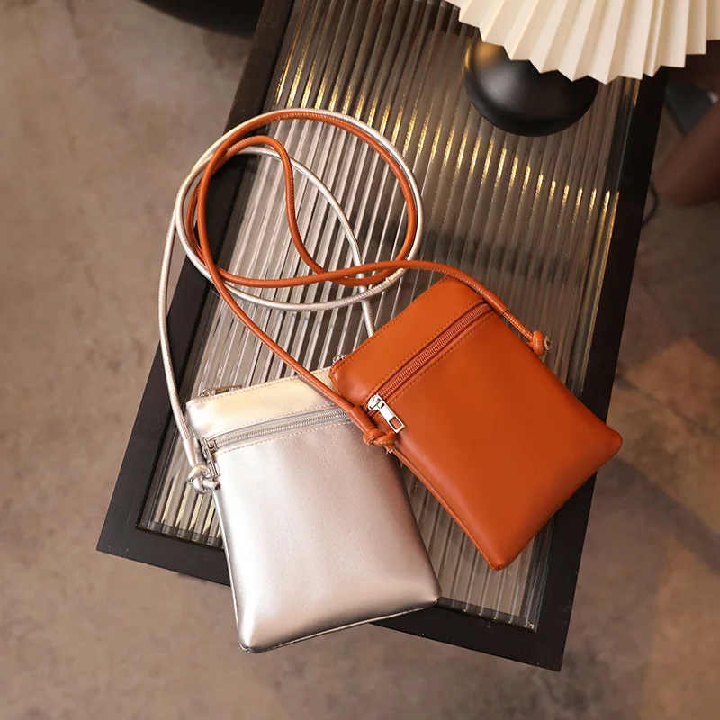 Новая сумка для мобильного телефона из искусственной кожи, женские сумки через плечо, модные простые однотонные мини-сумки с двойной молнией для девочек
Новая сумка для мобильного телефона из искусственной кожи, женские сумки через плечо, модные простые однотонные мини-сумки с двойной молнией для девочек