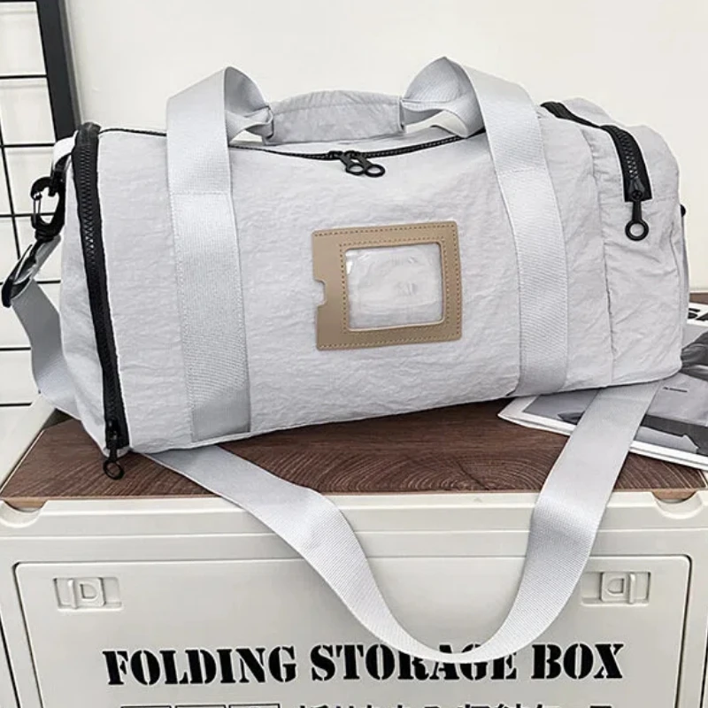 Женская сумка для багажа из нейлоновой ткани, стильная портативная дорожная сумка для альпинизма, кемпинга, покупок, пешего туризма, треккинга, сумка на короткие расстояния
Женская сумка для багажа из нейлоновой ткани, стильная портативная дорожная сумка для альпинизма, кемпинга, покупок, пешего туризма, треккинга, сумка на короткие расстояния