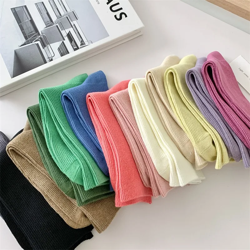 New solid color candy colored cotton women's mid tube socks, colored double needle women's socks
New solid color candy colored cotton women's mid tube socks, colored double needle women's socks
