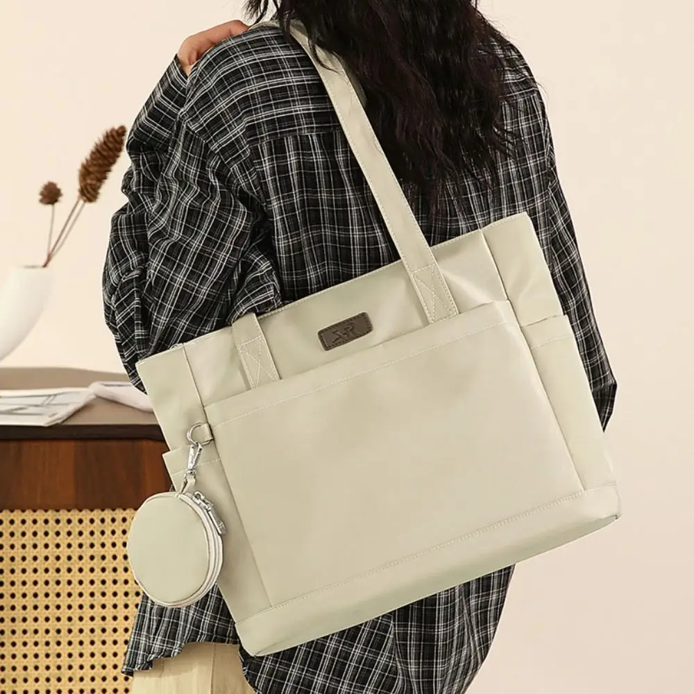 Versatile Nylon Cloth Shoulder Bag Solid Color Japanese Style Canvas Tote Bag Simple Large Capacity Commuting Handbag Travel
Versatile Nylon Cloth Shoulder Bag Solid Color Japanese Style Canvas Tote Bag Simple Large Capacity Commuting Handbag Travel