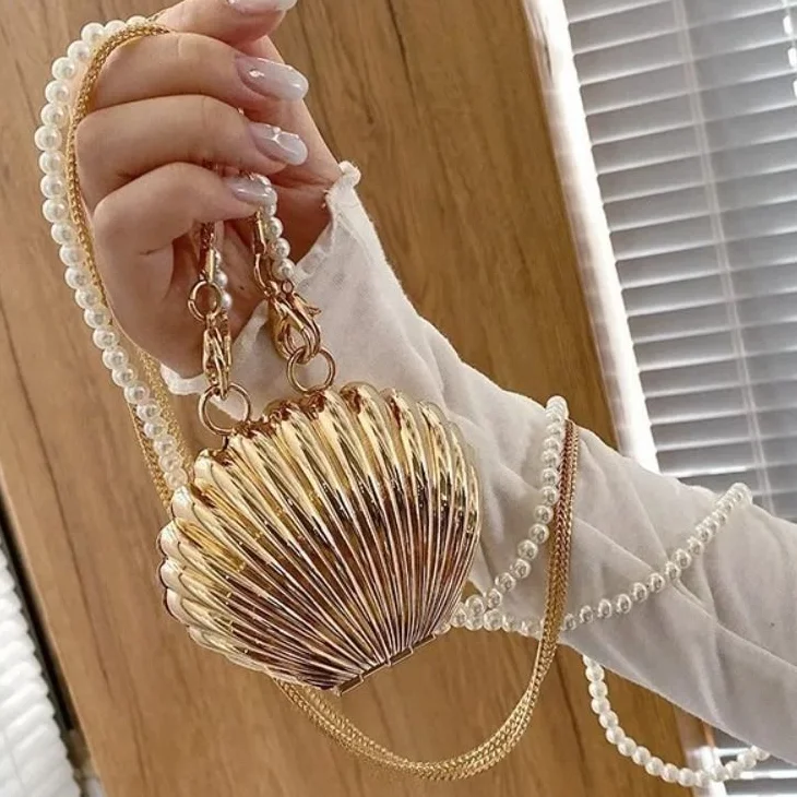 High Quality Luxury Women Dinner Bag Shell Shape Pearl Chain Mini Shoulder Bag Metal Fashion Lipstick Bag Party
High Quality Luxury Women Dinner Bag Shell Shape Pearl Chain Mini Shoulder Bag Metal Fashion Lipstick Bag Party