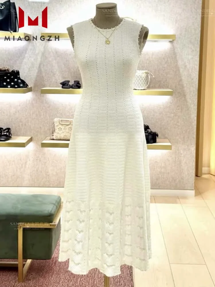 Fashion Slimming Elegant Knitted Dresses For Women O Neck Sleeveless Hollow Out White 2025 Summer New Female Party Dress Clothes
Fashion Slimming Elegant Knitted Dresses For Women O Neck Sleeveless Hollow Out White 2025 Summer New Female Party Dress Clothes