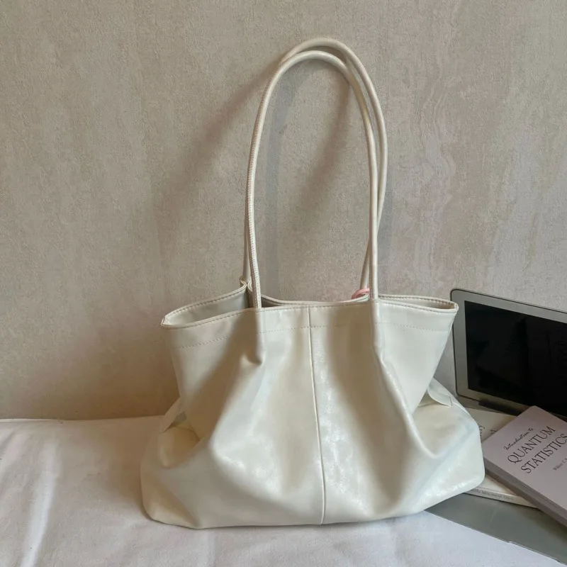 White Causal Large Capacity Tote Bag Women High Quality Soft Shoulder Bag PU Leather Trend Underarm Bag Fashion Commuter Handbag
White Causal Large Capacity Tote Bag Women High Quality Soft Shoulder Bag PU Leather Trend Underarm Bag Fashion Commuter Handbag