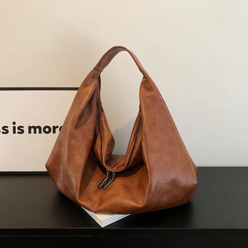 Large Capacity Shoulder Bag Women High Quality Faux Leather Minimalist Trend Tote Bag 2025 Hit Fashion Casual Luxe Hobo Handbag
Large Capacity Shoulder Bag Women High Quality Faux Leather Minimalist Trend Tote Bag 2025 Hit Fashion Casual Luxe Hobo Handbag