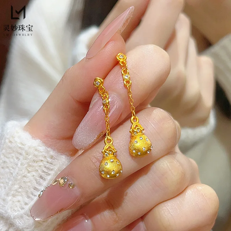9999 24K real gold luxury jewelry dot diamond brushed tassel earrings solid money bag earrings for women gift
9999 24K real gold luxury jewelry dot diamond brushed tassel earrings solid money bag earrings for women gift