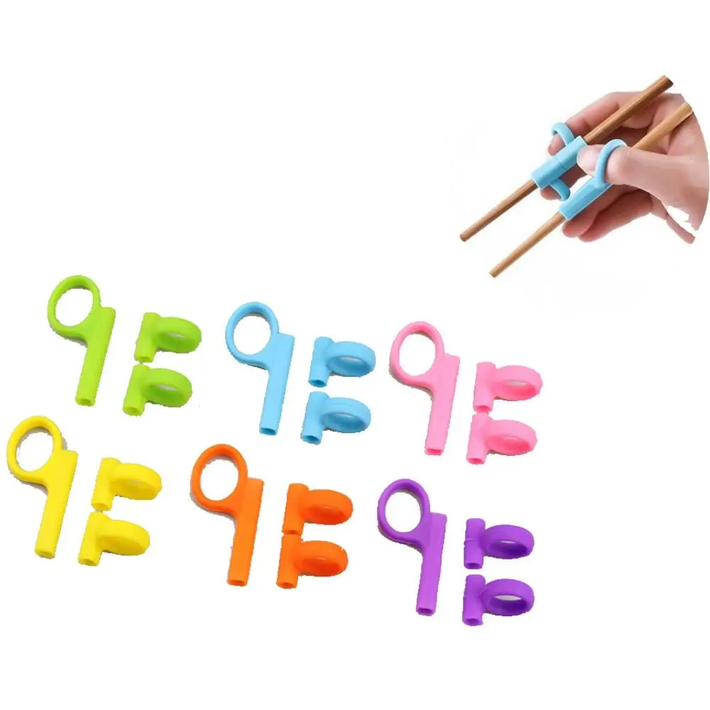 Silicone Kids Holding Chopsticks Correcting Ring Kitchen Tableware Eating Practice Chopsticks Accessories
Silicone Kids Holding Chopsticks Correcting Ring Kitchen Tableware Eating Practice Chopsticks Accessories